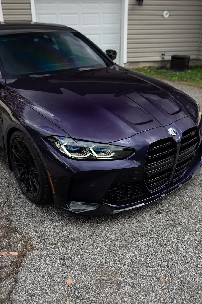 Purple BMW G80 M3 with full-front paint protection film installed