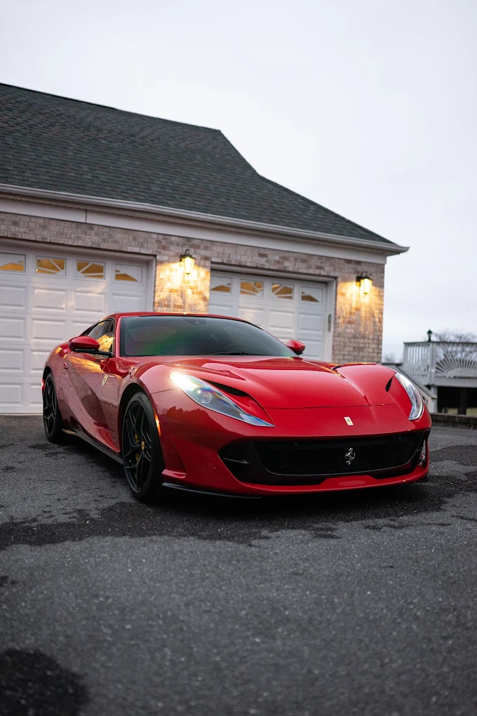 Red Ferrari 812 after multi-stage paint correction