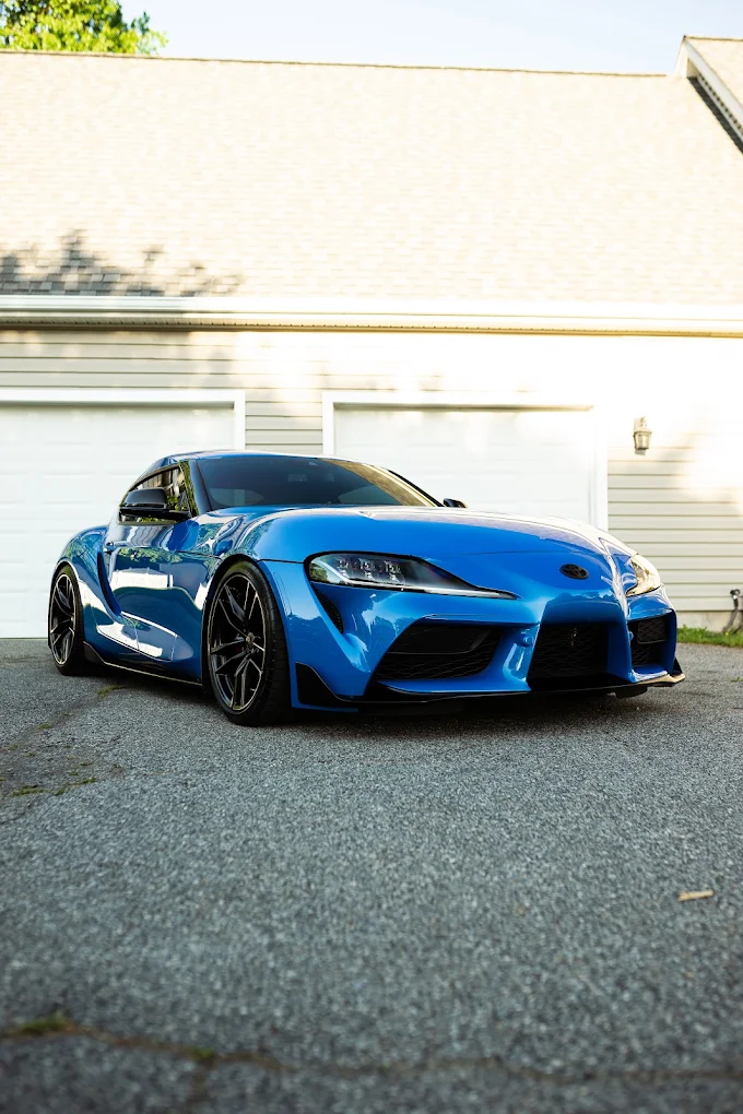 Blue Toyota Supra protected after a new vehicle package